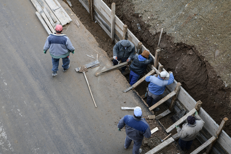 concrete expert working on concrete walls