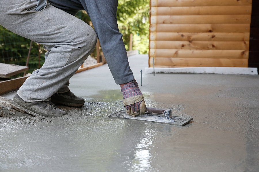 concrete expert working on patio